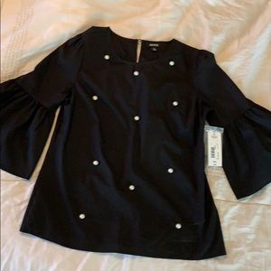 ANA black shirt with pearl detail & bell sleeves.